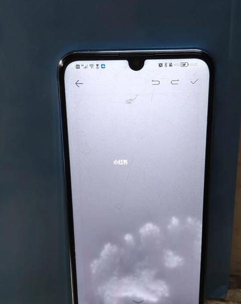 手机进水后音量键总是自动调高